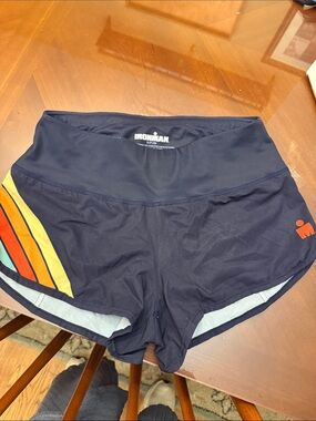 Official Ironman woman's shorts  w/ built in undies & zipper back pocket. Small